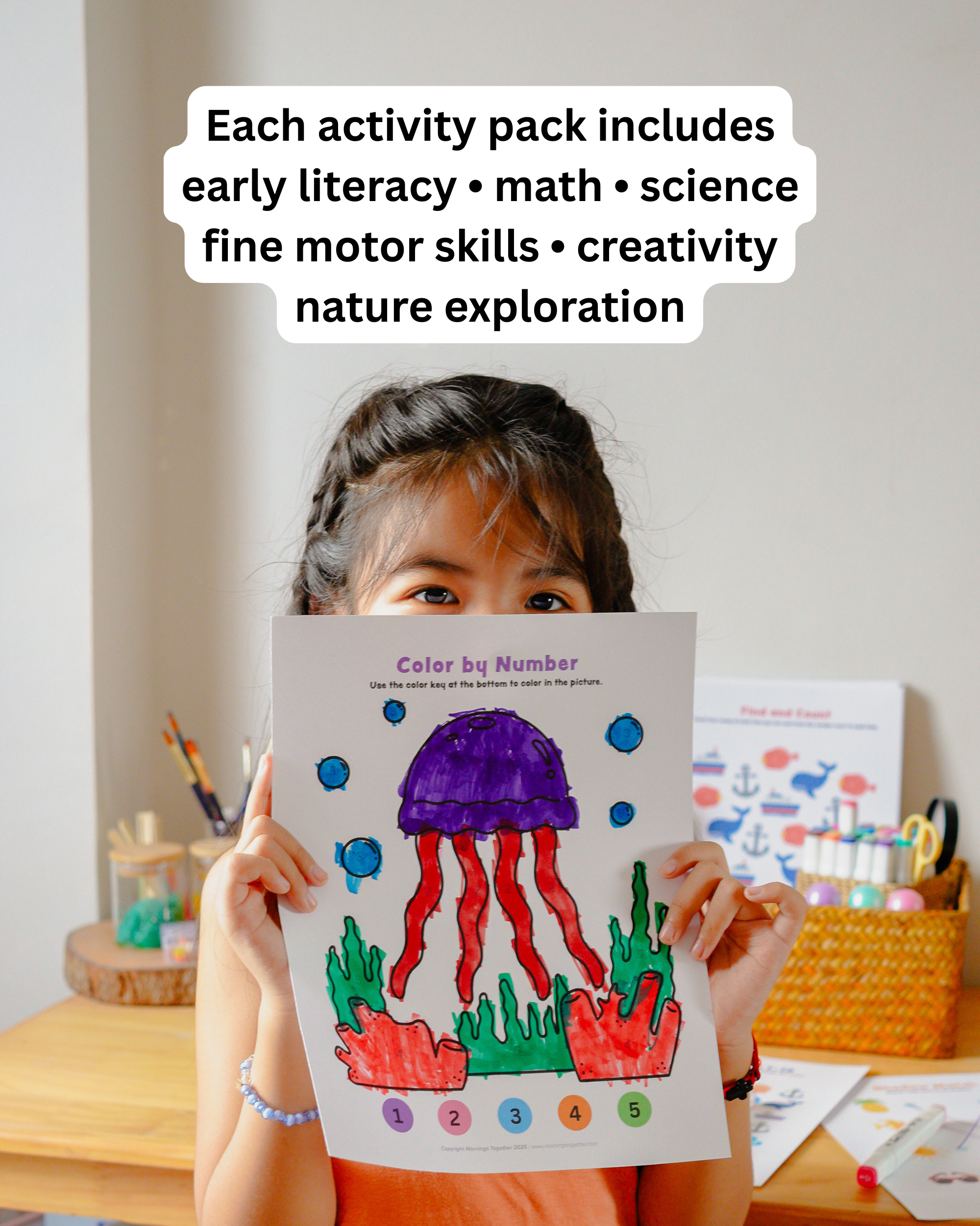 A young girl holds up a colorful 'Color by Number' activity sheet featuring a purple jellyfish and red tentacles, with text overlay at the top describing the educational activities included in each pack.